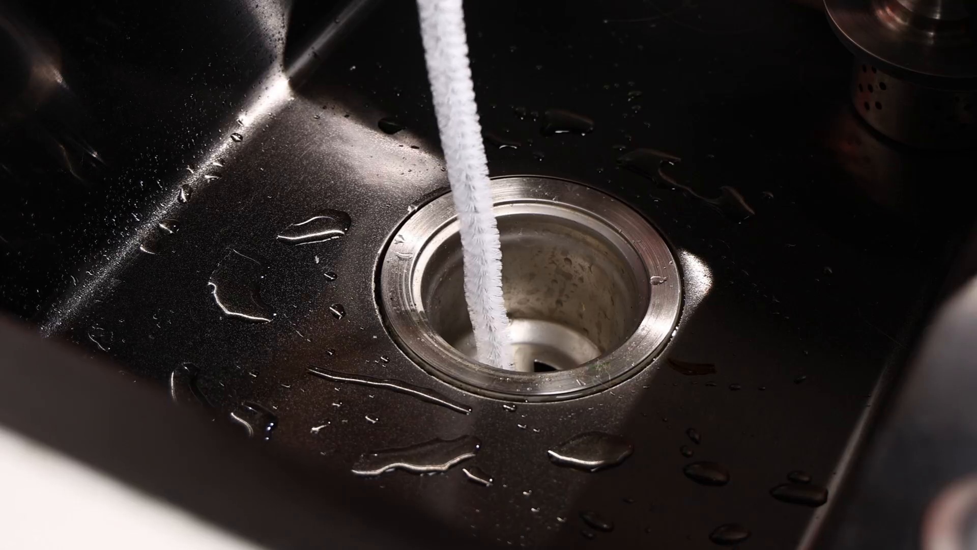 DrainFix Pro being used on kitchen sink drain — customer review Lagos